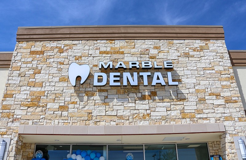 Marble Dental McKinney sign on building