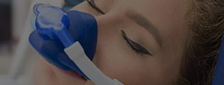 Closeup of patient with nitrous oxide mask